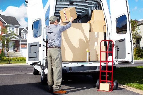 Experienced movers handling office equipment